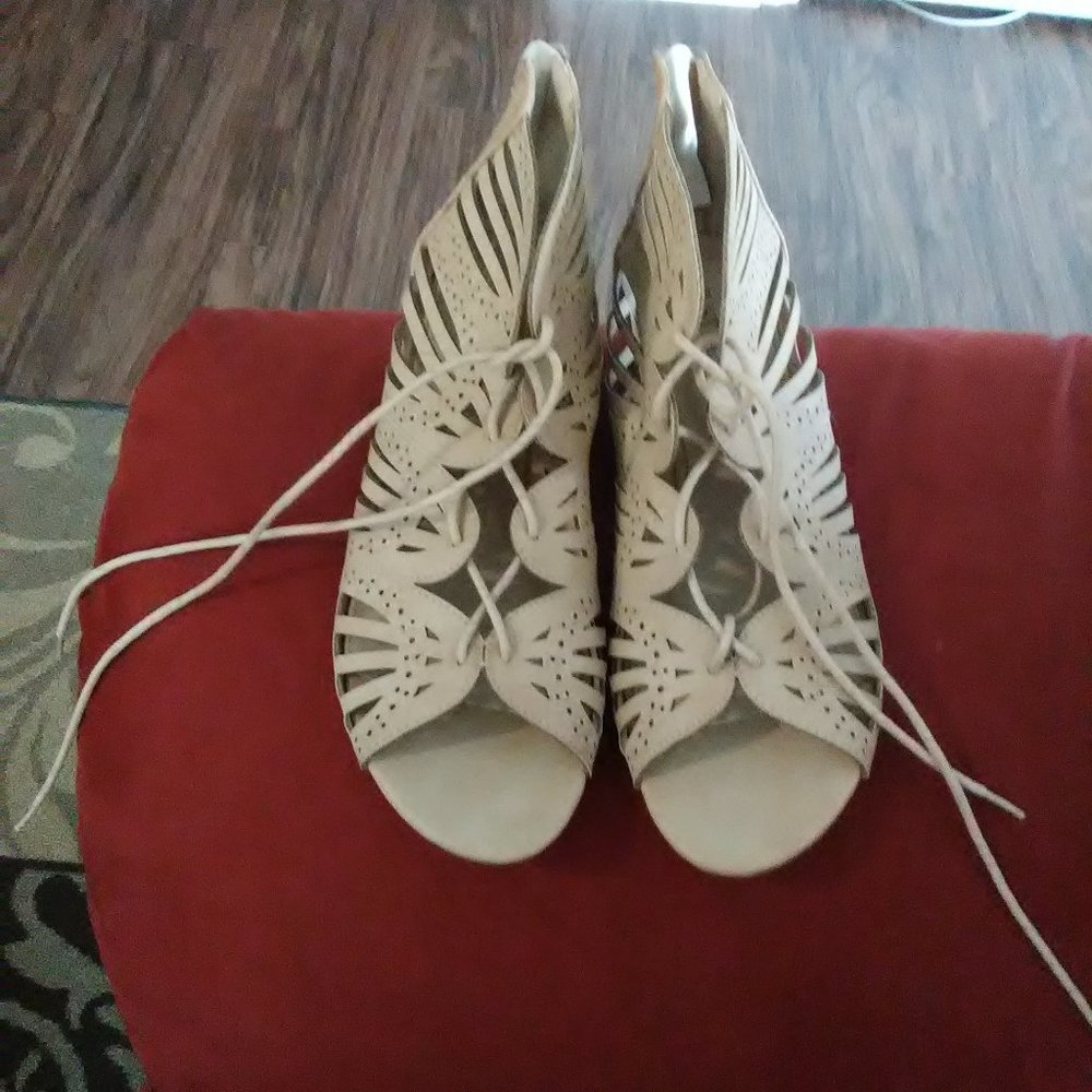 Tan laced up sandles with wedge heel